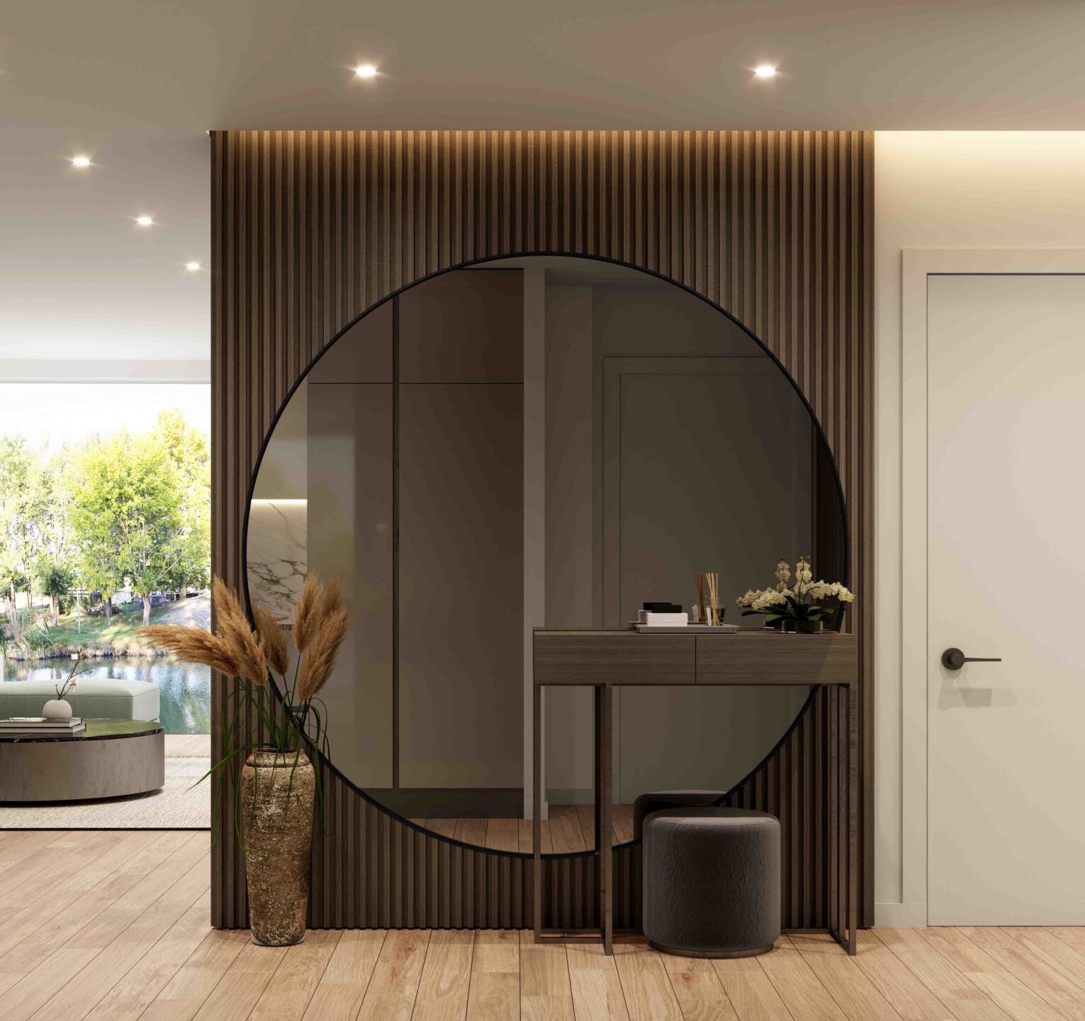 duże okrągłe lustro w czarnej ramie w holu na brązowych lamelach