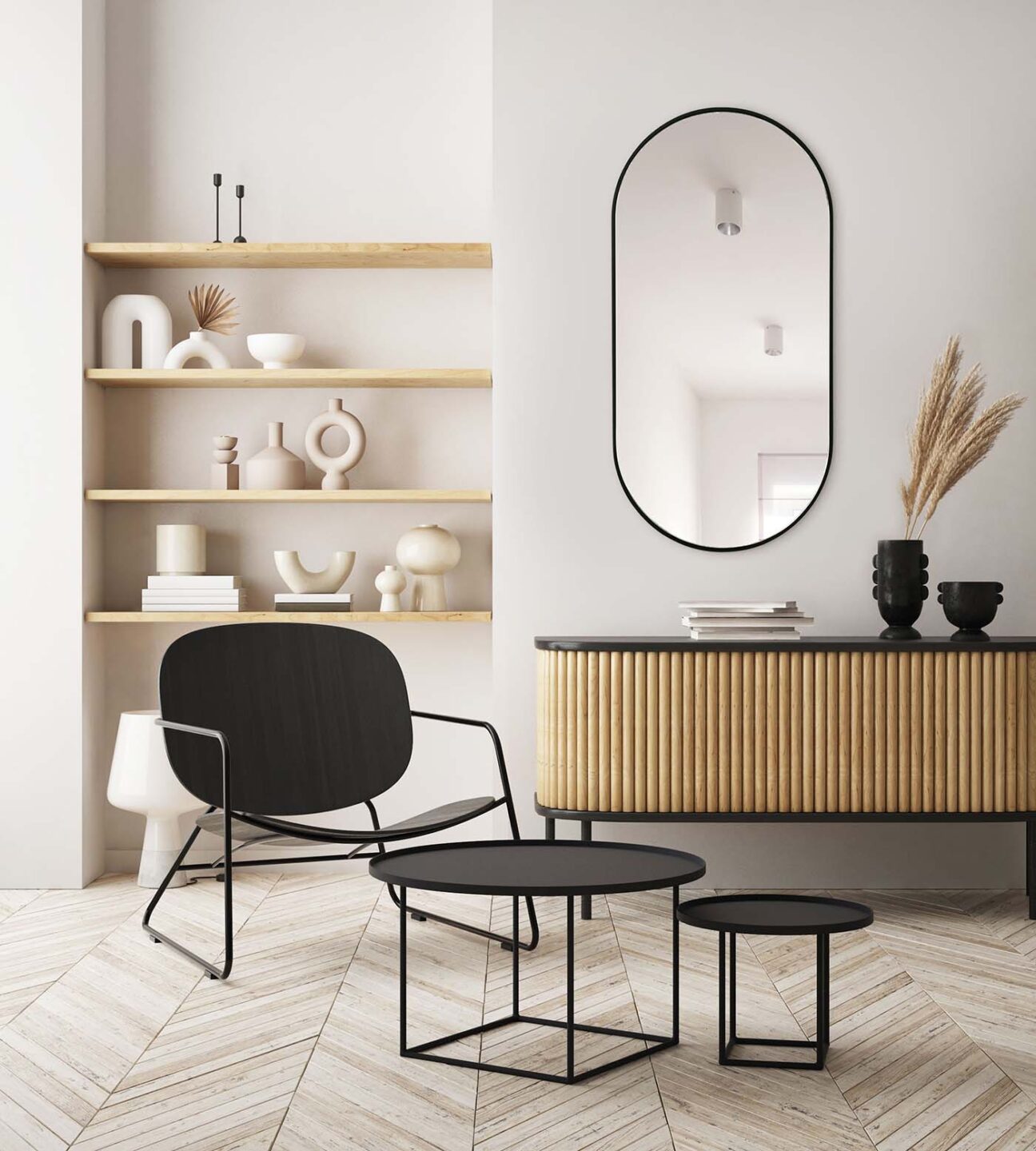 lustro owalne w czarnej ramie nad bufetem