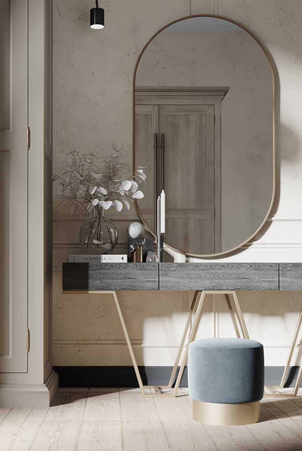 lustro owalne w złotej ramie w salonie