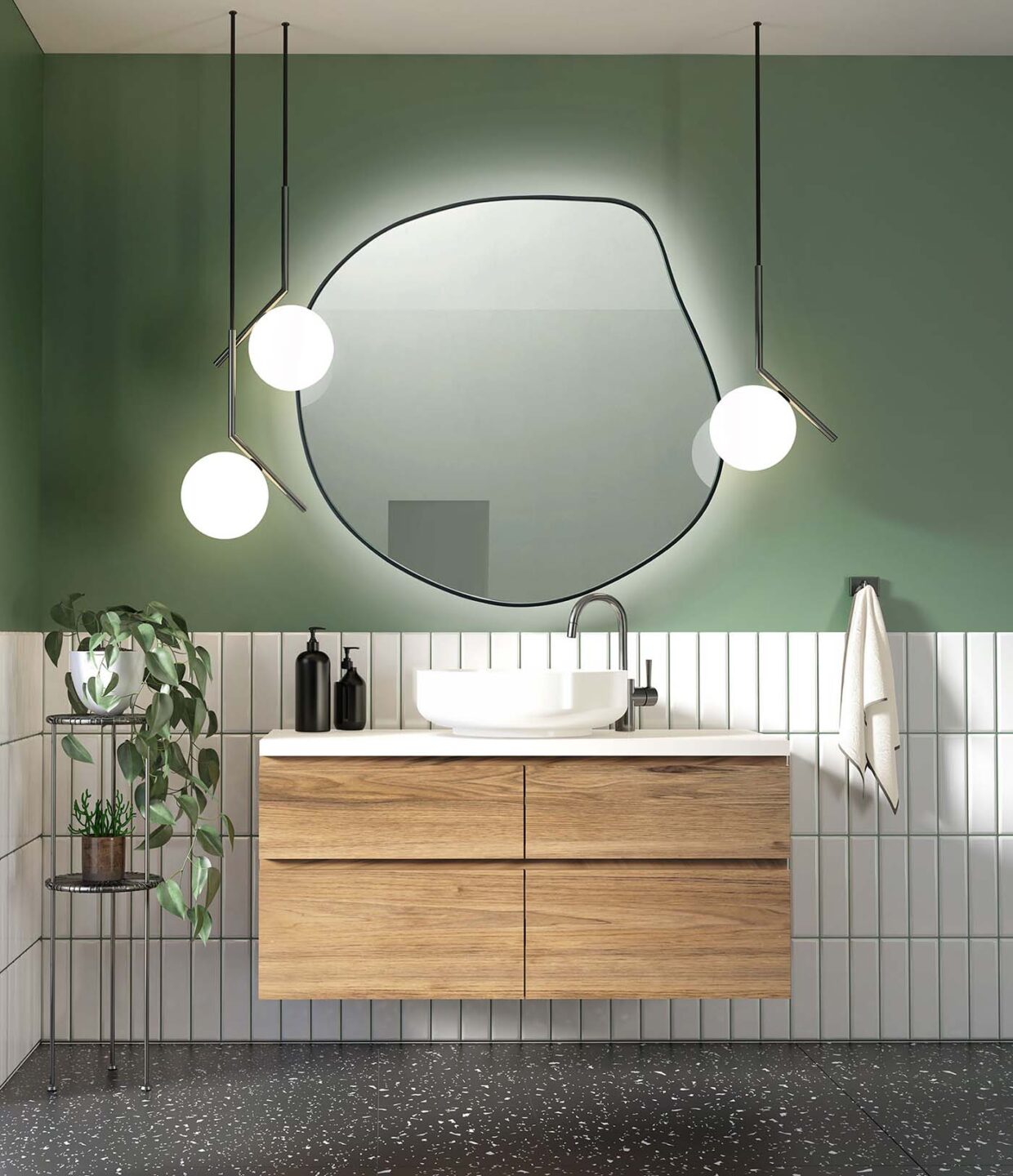 lustro o organicznym kształcie w czarnej ramie z podświetleniem w zielonej łazience