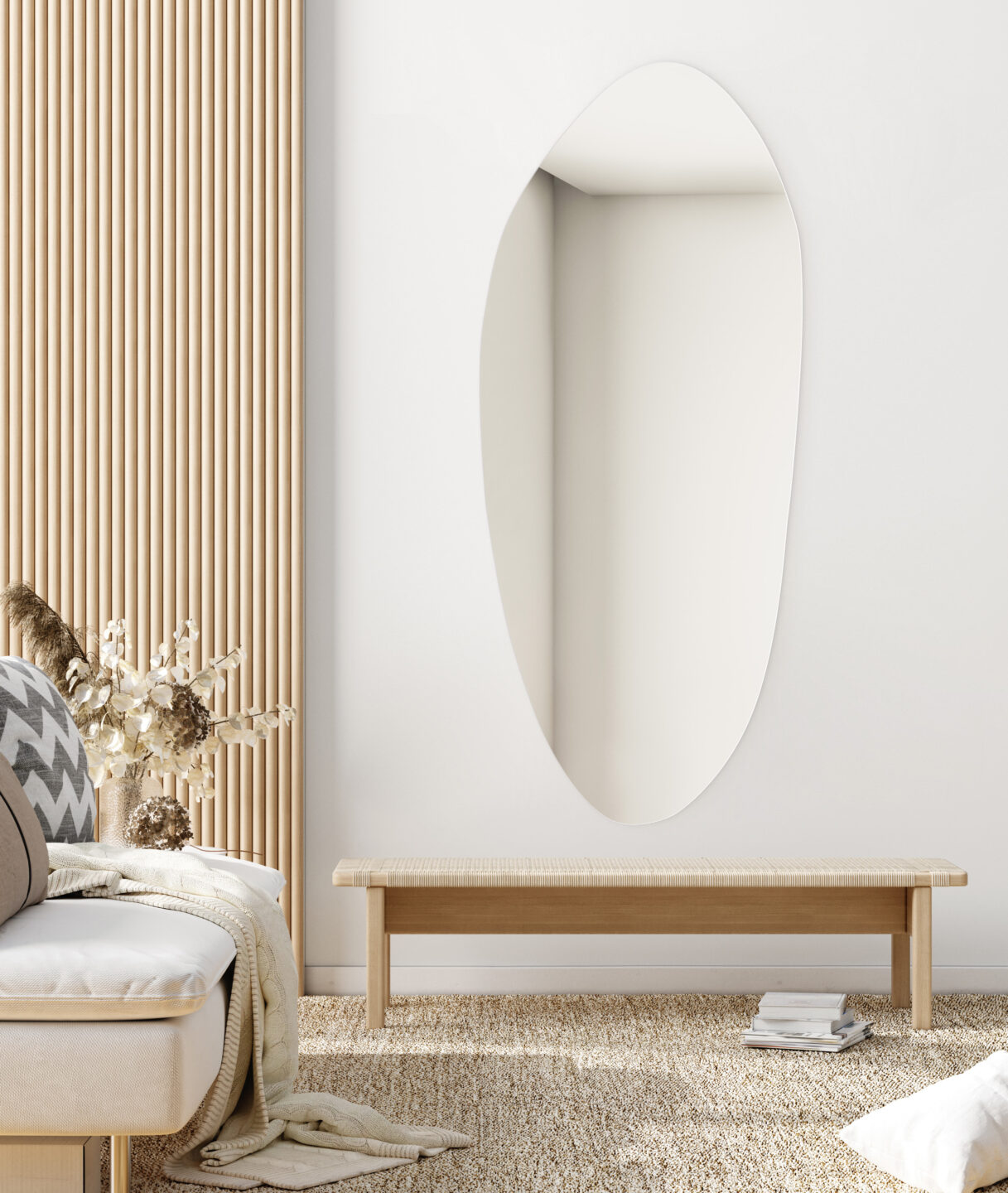 lustro o kształcie nieregularnym wiszące w salonie