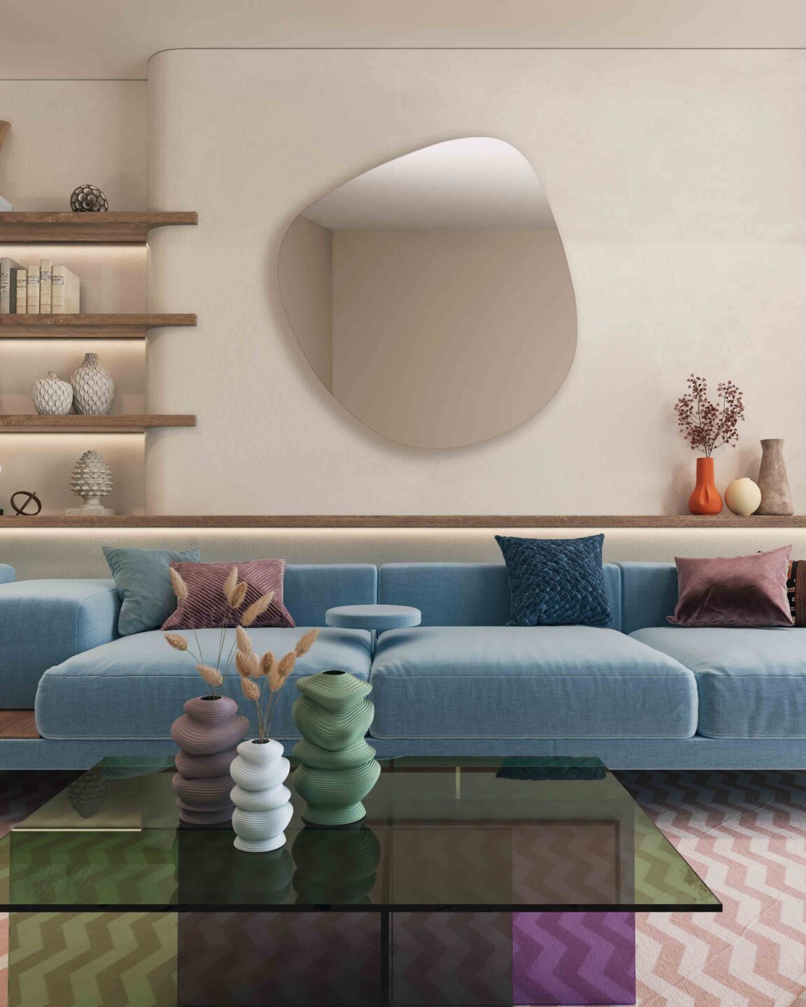 lustro nieregularne buli w salonie nad niebieska sofa