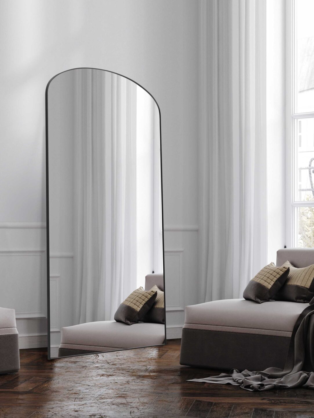 lustro z łukiem Vinta oparte o ścianę